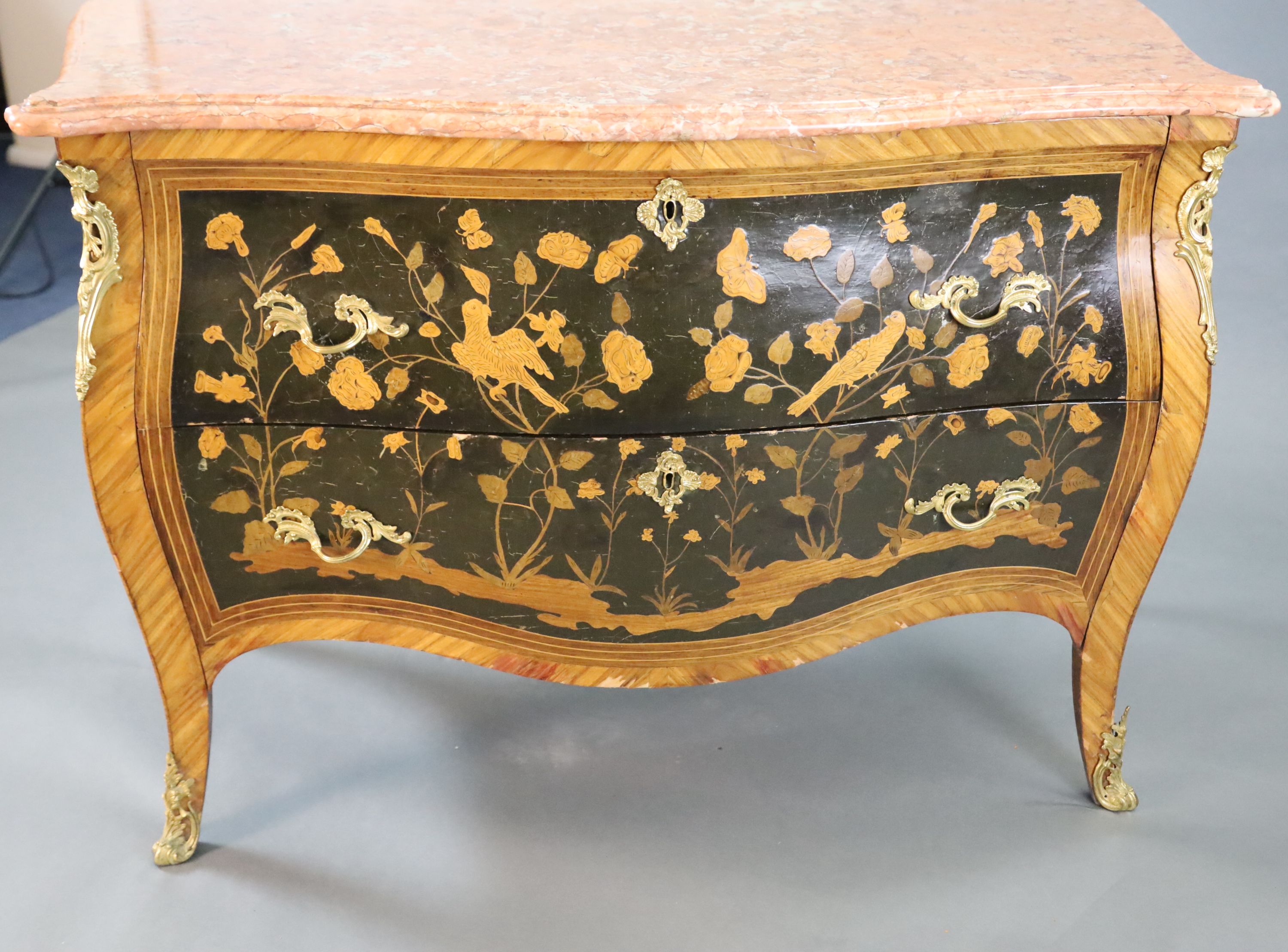 A French Louis XV style kingwood and ormolu mounted serpentine bombe commode, W.4ft D.2ft H.2ft 11in.